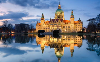 hannover limousine service The beautifully illuminated Marienburg Castle in Hanover at dusk.