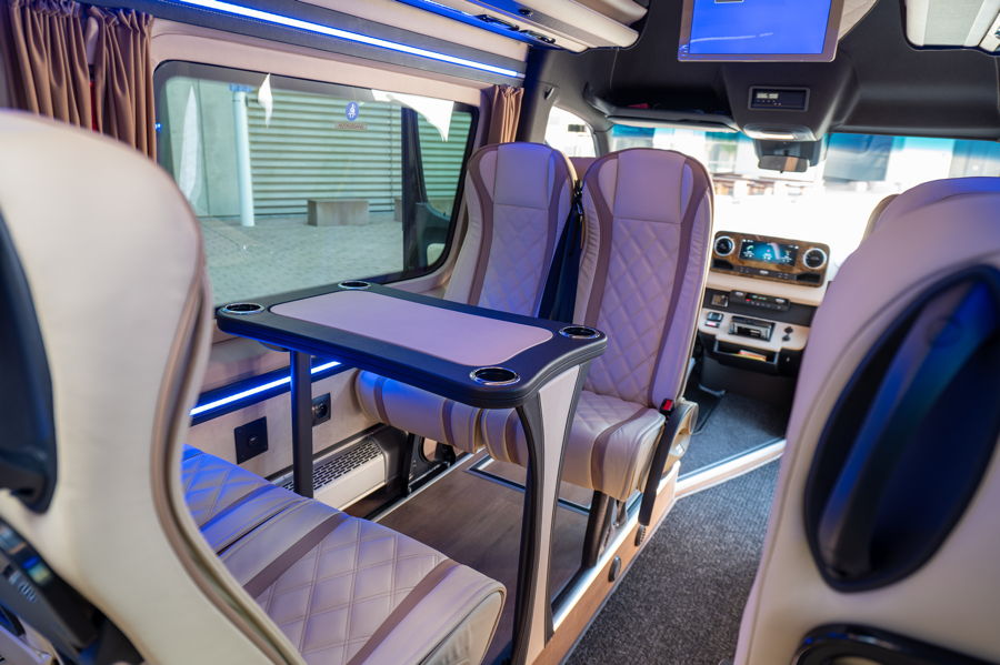 VIP-Sprinter-Bus Luxurious interior in a black Mercedes VIP Sprinter bus from a chauffeur service.